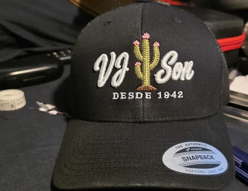 Black snapback trucker with the white VJ Son Desde 1942 logo and a green cactus