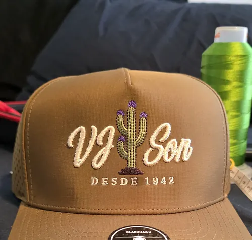 Tan cap with the VJ Son Desde 1942 script logo and a multicolor cactus
